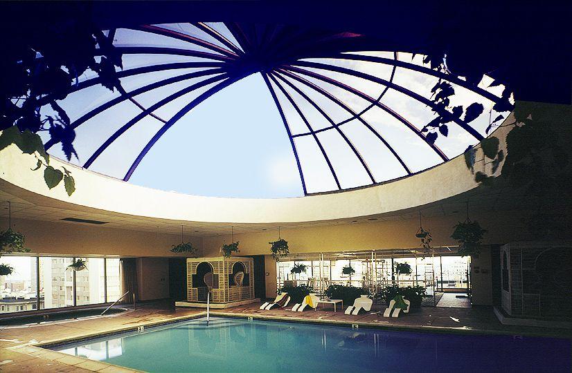 Urban pool with retractable glass roof